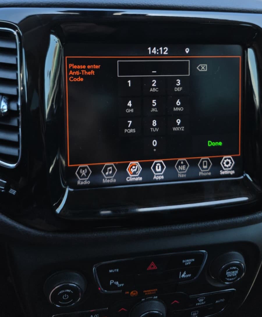Continental TF 8.4-inch Uconnect screen asking for the anti-theft radio code